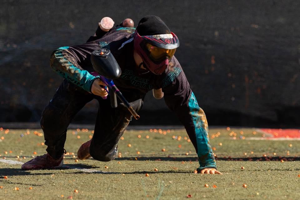 Paintball player diving on the speedball field at Matts Outback
